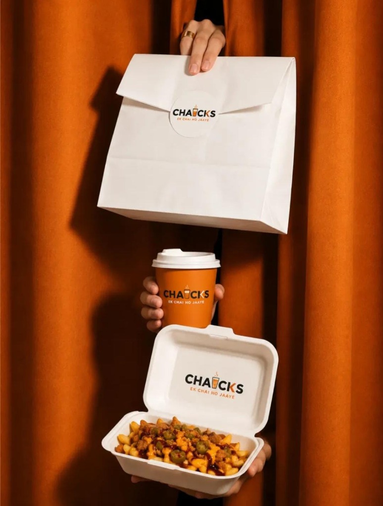 CHAICKS branded packaging showing takeaway bag, cup, and food container